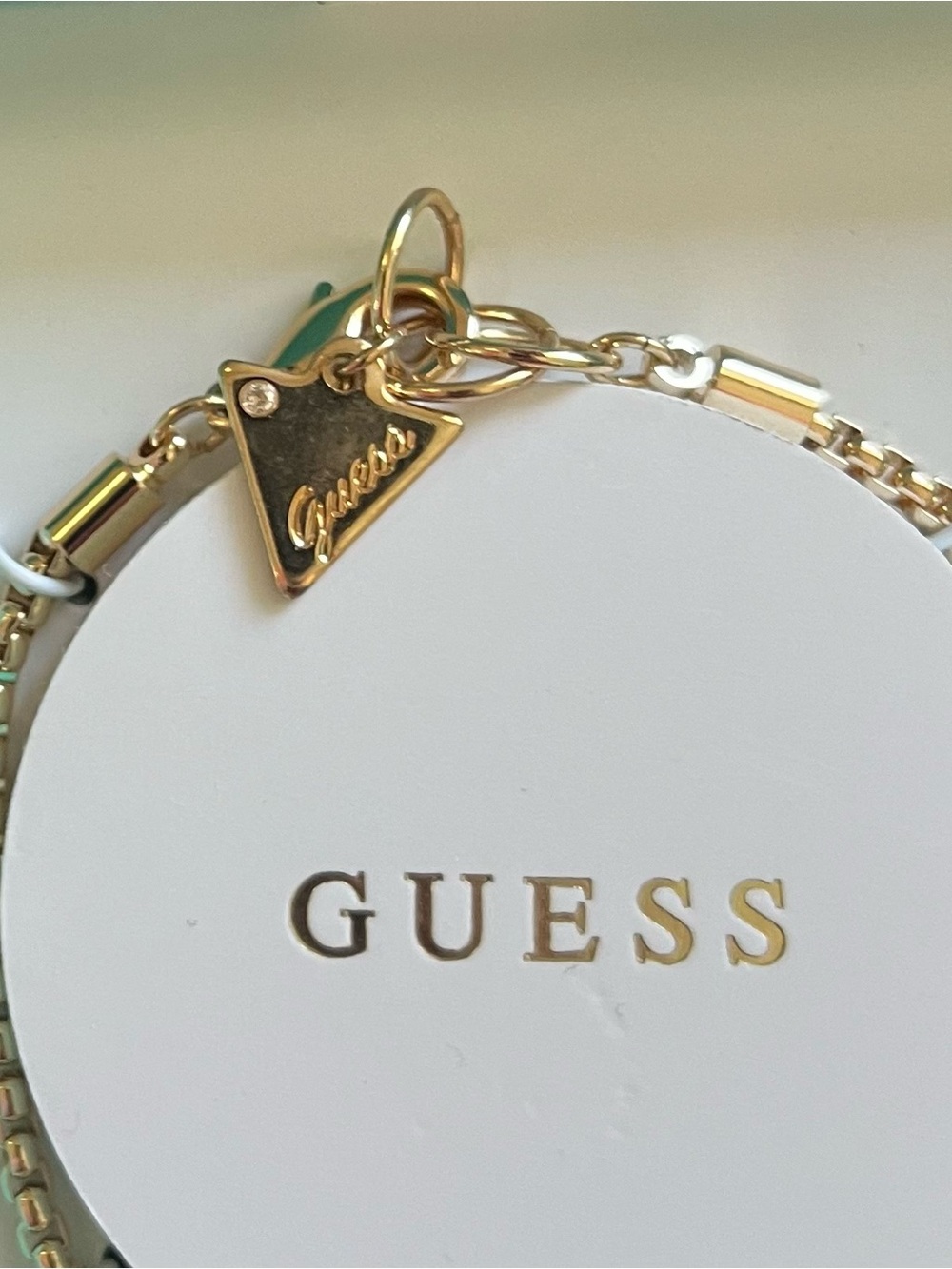 GUESS Gold-Tone Charm Bracelet with Black Accent - 7.5in - Picture 3 of 4
